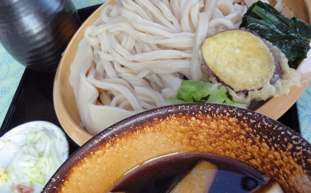 看板メニューの肉汁うどん